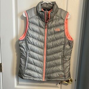 The North Face Quilted Gray and bright Tangerine colored Insulated Vest